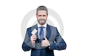 businessman demonstrating credit or debit card. empty plastic business name card. successful ceo