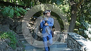 Businessman Descends Steps With A Bicycle.