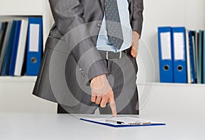 Businessman at the desk at office