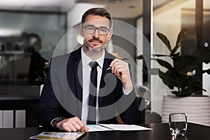 Businessman, desk and portrait with notes in office with consult for client in accounting. Financial advisor