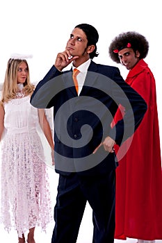 Businessman, devil and angel