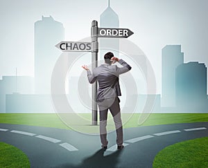 Businessman in difficult choice concept
