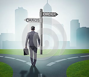 Businessman in difficult choice concept