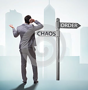 Businessman in difficult choice concept