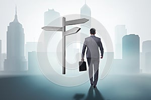 The businessman in difficult choice concept