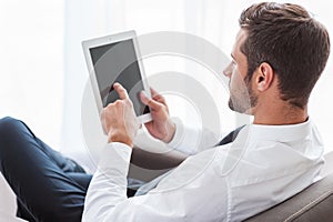 Businessman with digital tablet.