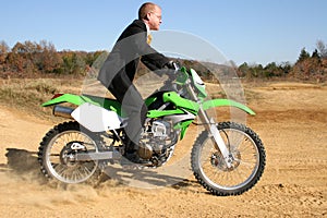 Businessman on Dirt Bike