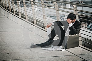 Businessman is disappointed from losing in stock exchange, economic crisis concept photo