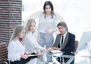 Businessman discussing with the business team contract terms