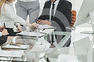 Businessman discussing with the business team contract terms