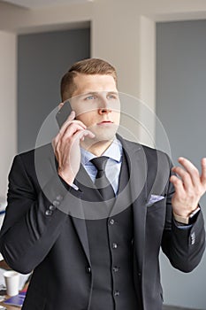 Businessman disputing on the phone