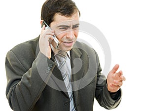 Businessman in distress speaks by phone