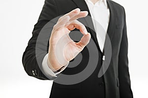 businessman doing ok gesture. High quality photo