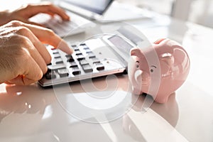 Businessman Doing Professional Accounting Using Calculator