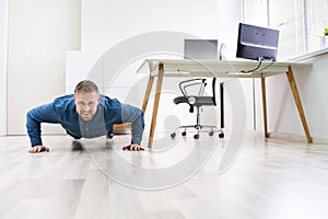 Businessman Doing Push Up