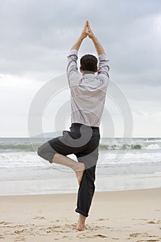 Businessman doing relaxation exercises