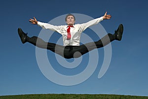 Businessman doing splits photo