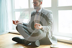 Businessman doing yoga