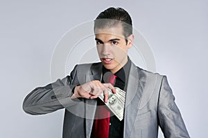 Businessman with dollar notes suit and tie