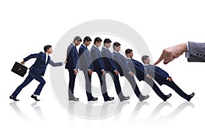 The businessman in domino effect business concept