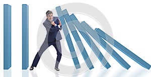 Businessman in domino effect business concept