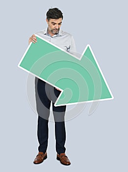 Businessman with a downward arrow