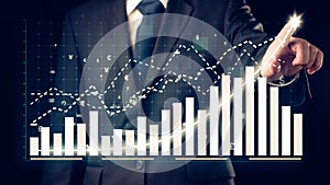 Businessman draw finance allusive graph chart showing business profit growth