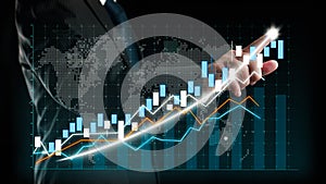 Businessman draw finance allusive graph chart showing business profit growth