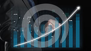 Businessman draw finance allusive graph chart showing business profit growth