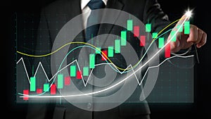 Businessman draw finance allusive graph chart showing business profit growth