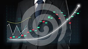 Businessman draw finance allusive graph chart showing business profit growth