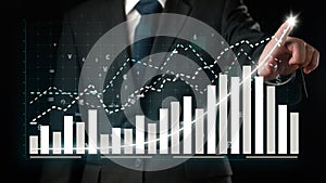 Businessman draw finance allusive graph chart showing business profit growth