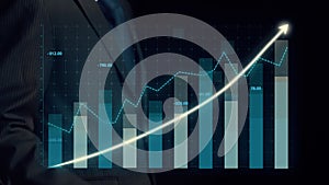 Businessman draw finance allusive graph chart showing business profit growth