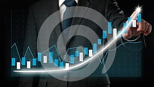 Businessman draw finance allusive graph chart showing business profit growth