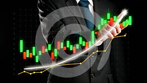 Businessman draw finance allusive graph chart showing business profit growth