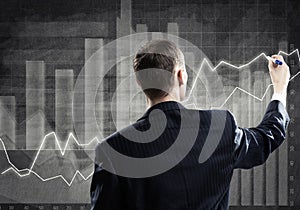 Businessman draw progress concept