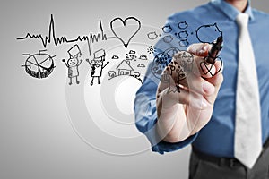 Businessman drawing chart heartbeat
