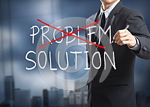 Businessman drawing crossing out problem and finding the solution
