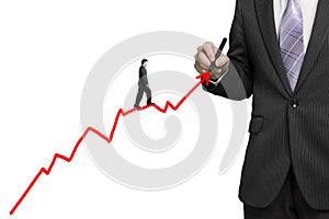 Businessman drawing growth red arrow and another walk on it