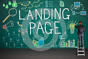Businessman Drawing Landing Page Concept On Blackboard photo