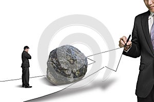 Businessman drawing road with growth arrow and large rock on the