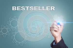 Businessman drawing on virtual screen. bestseller concept