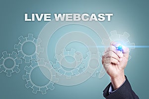 Businessman drawing on virtual screen. live webcast concept