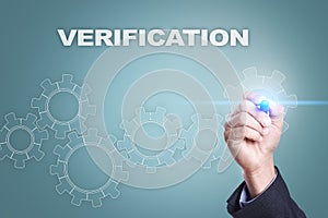 Businessman drawing on virtual screen. verification concept photo