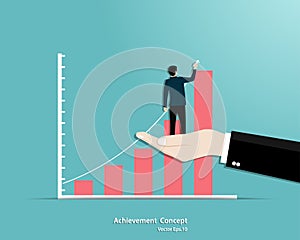 Businessman draws graph of growth standing in manager hand support