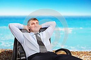 Businessman dreaming about vacation