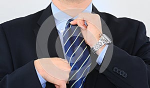 Businessman is dressing up