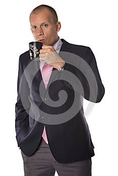 Businessman drinking coffee isolated on white background
