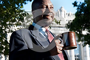 Businessman Drinking Coffee Outdoors