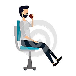 businessman drinking coffee seated in office chair